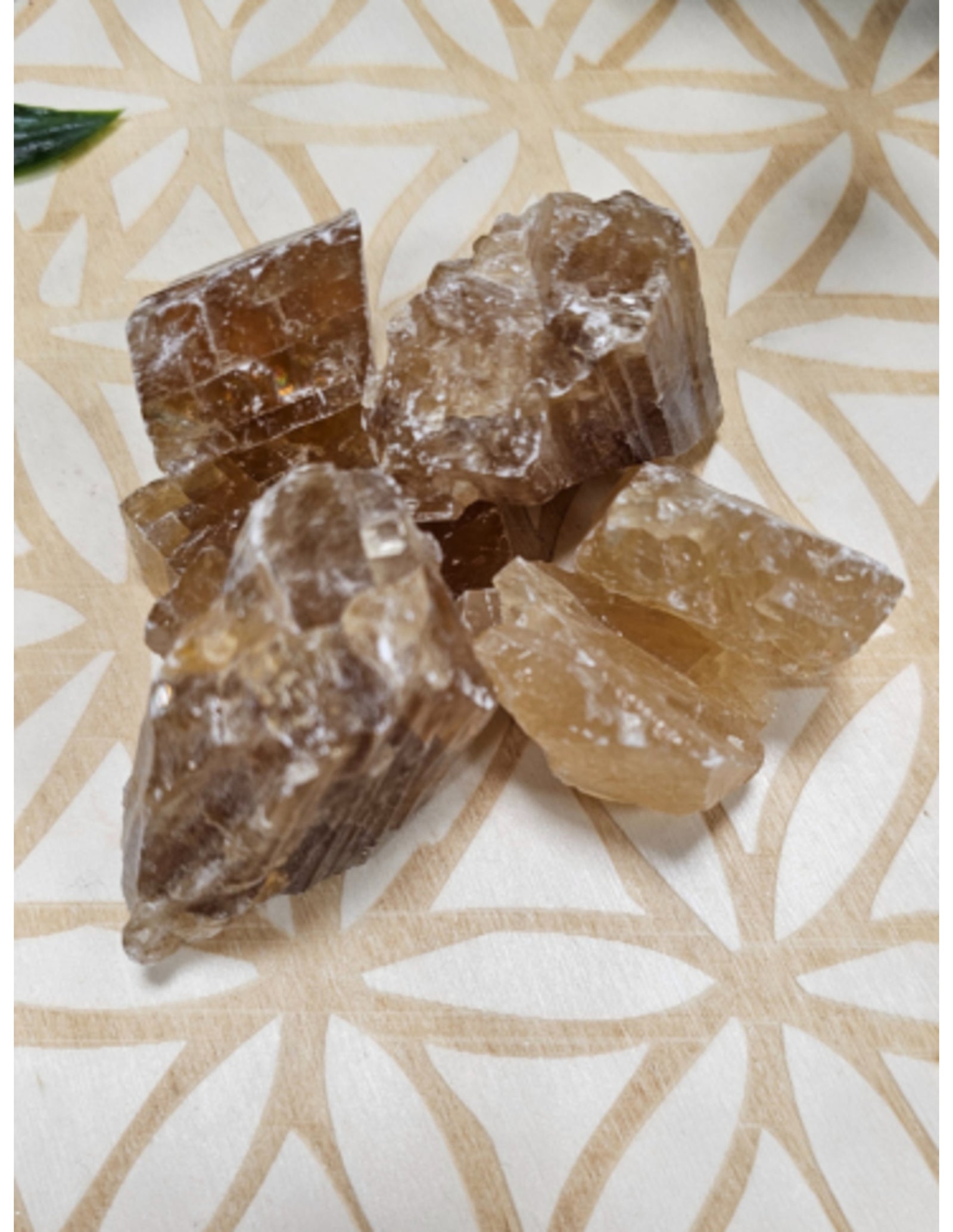 Calciet honing 250 gr. ruwe brokjes